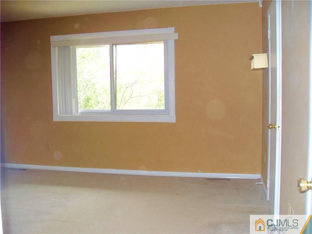 217 Probasco Road East Windsor, NJ 08520 - Photo 9 of 15 a view of a small space with window