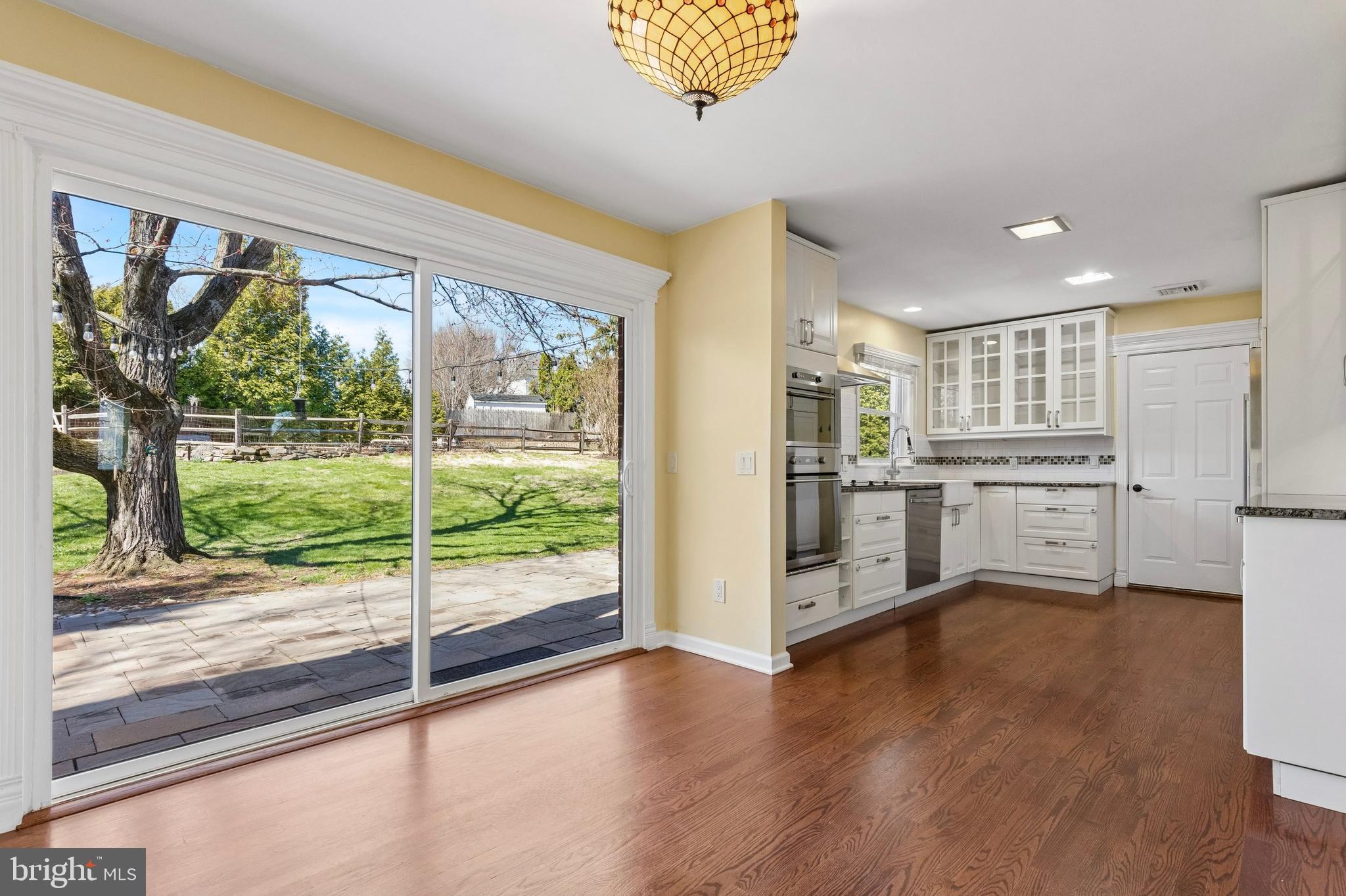 835 North Trooper Road Eagleville, PA 19403 - Photo 19 of 57 Oversized slider from dining area leads to patio