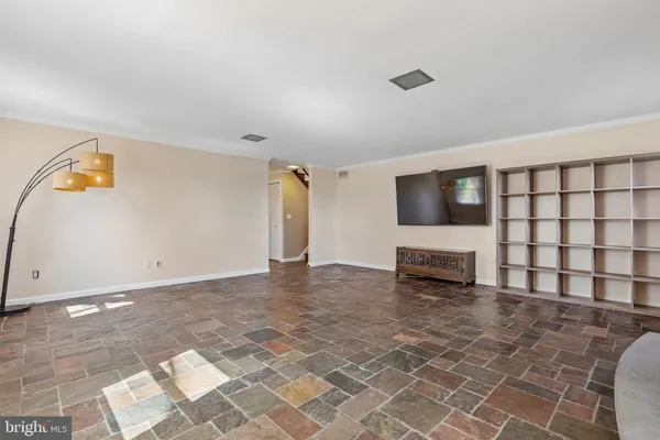 a view of a livingroom with furniture and wooden floor