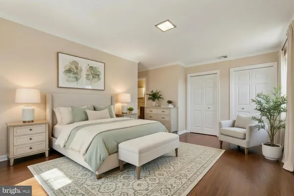 a bedroom with a bed and a night lamp