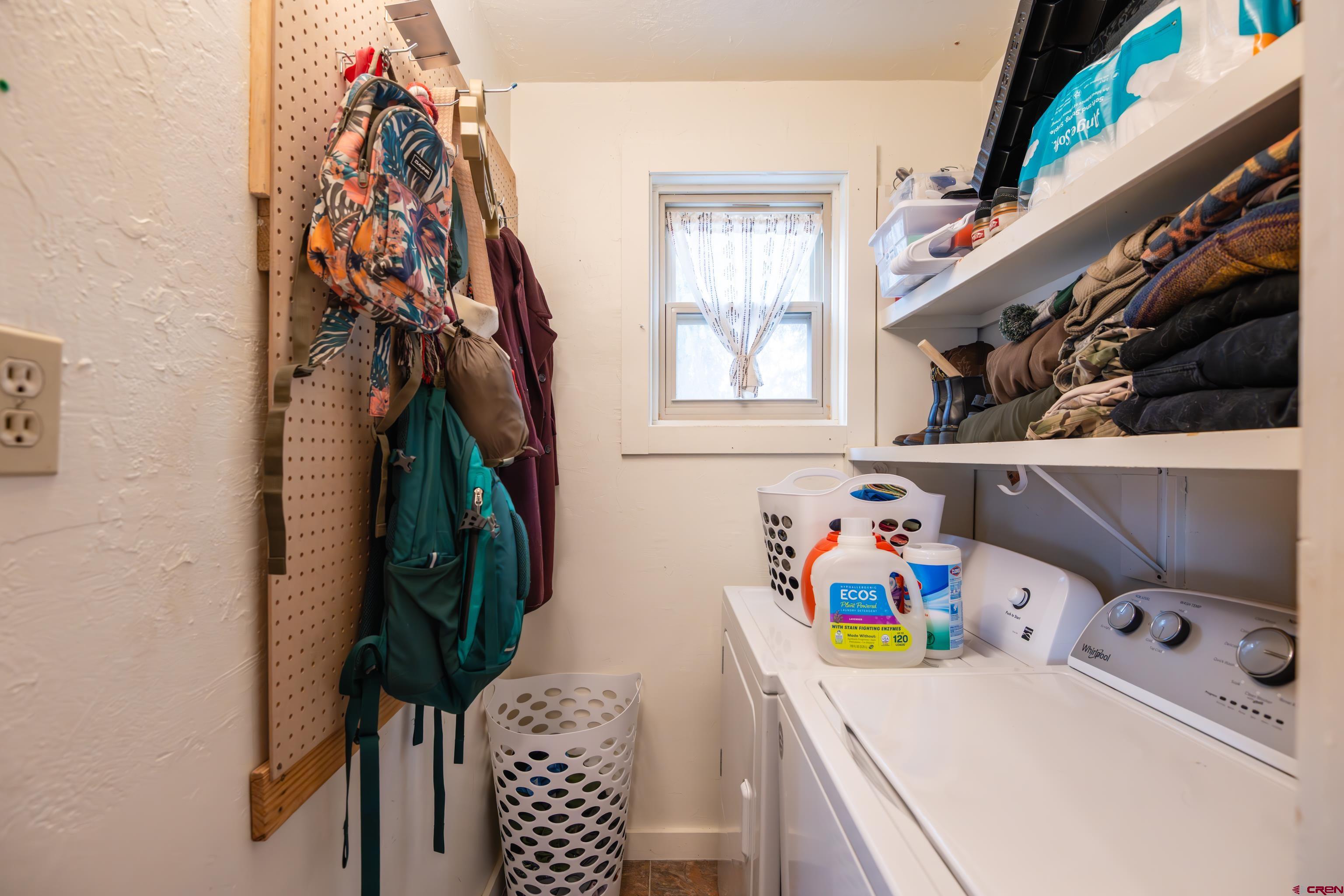 101 North 10th Street, Unit 2 Gunnison, CO 81230 - Photo 14 of 28 a room with a baby crib and a window
