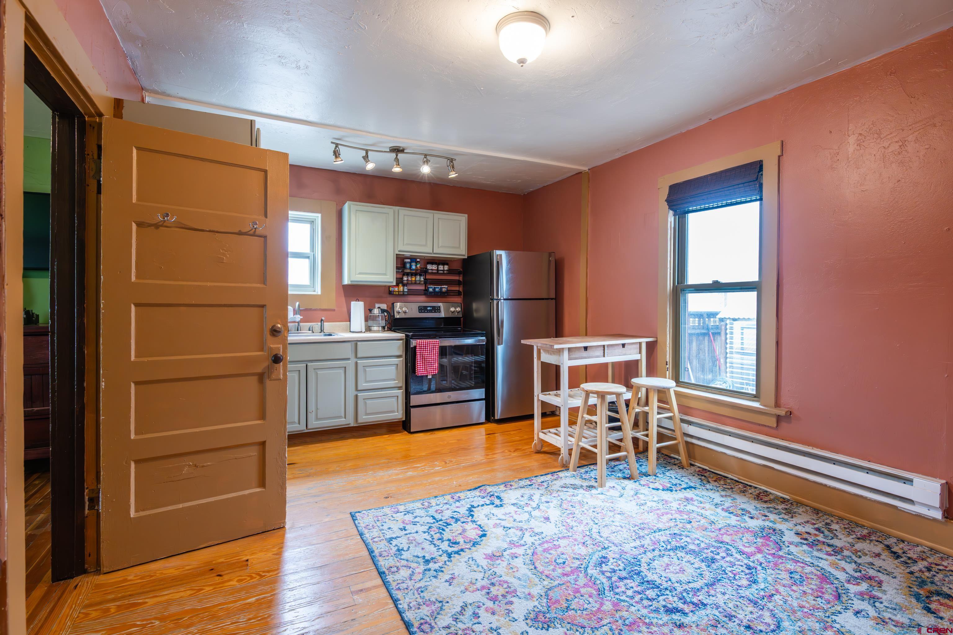 101 North 10th Street, Unit 2 Gunnison, CO 81230 - Photo 15 of 28 a room with furniture and a window