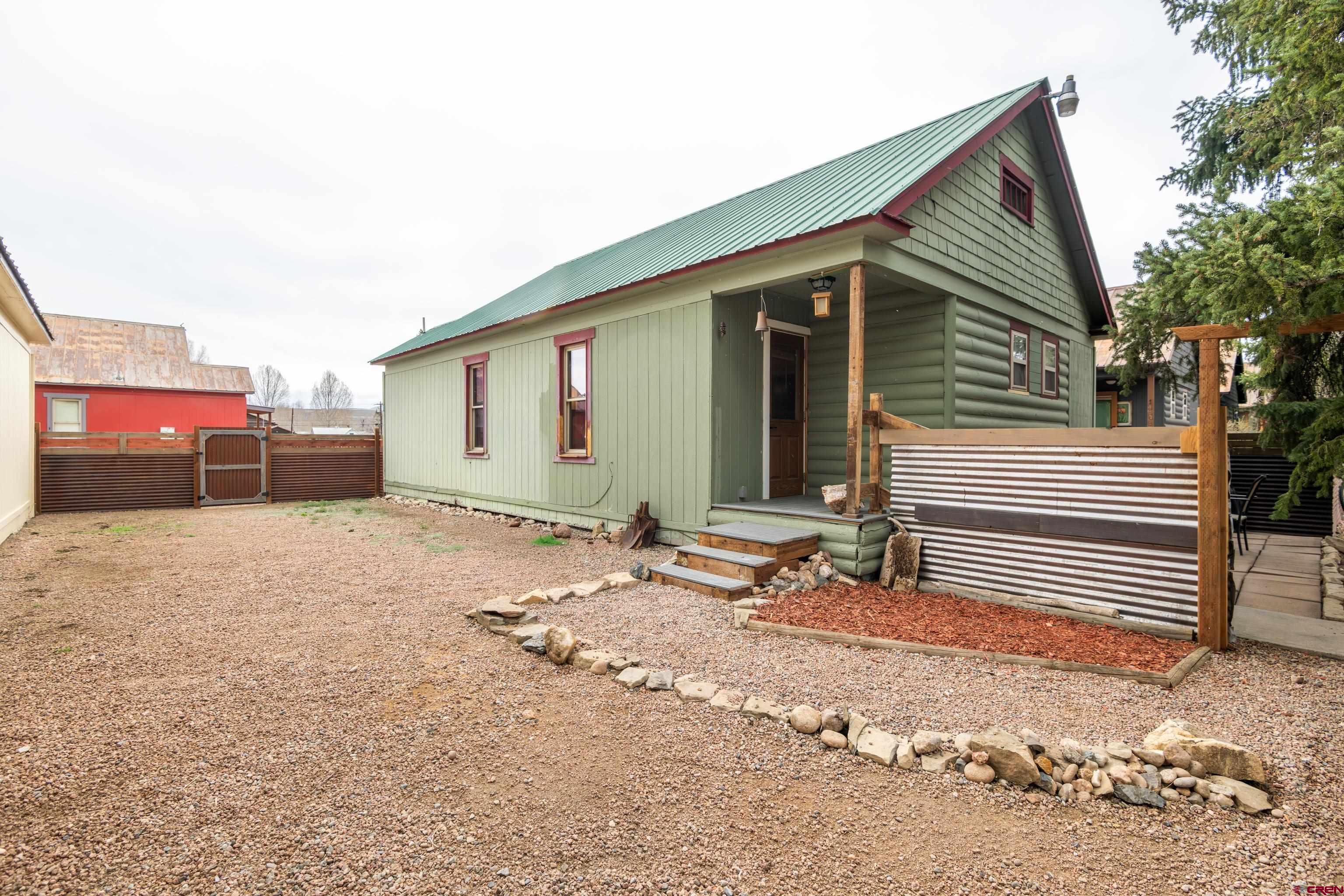 101 North 10th Street, Unit 2 Gunnison, CO 81230 - Photo 2 of 28 a backyard of a house