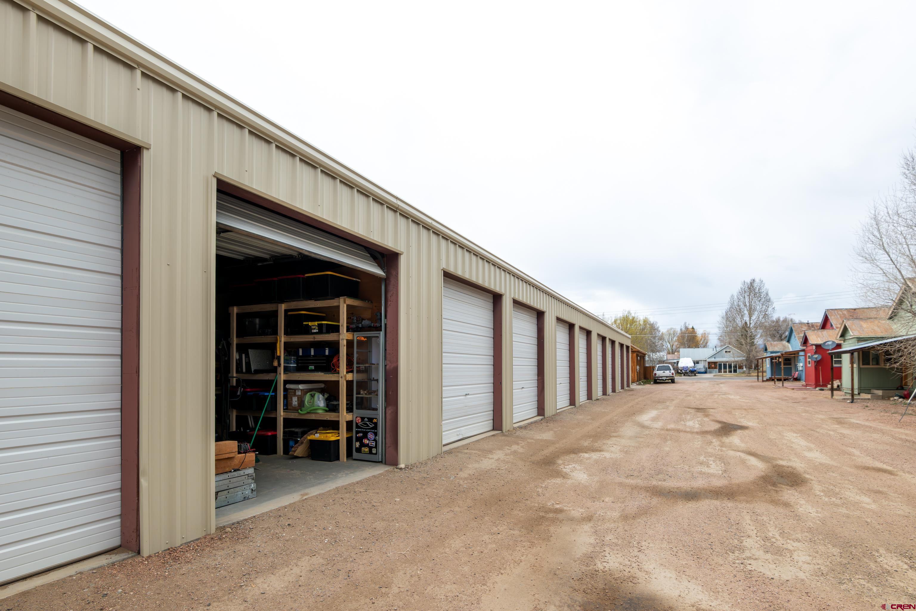 101 North 10th Street, Unit 2 Gunnison, CO 81230 - Photo 26 of 28 a view of a house with a large window and stairs