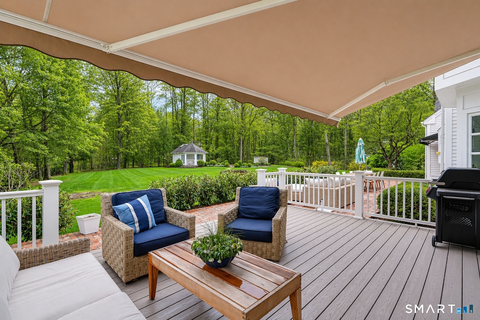 66 Gate Stone Lane Fairfield, CT 06824 - Photo 35 of 39 2 separate outdoor seating areas under custom awning