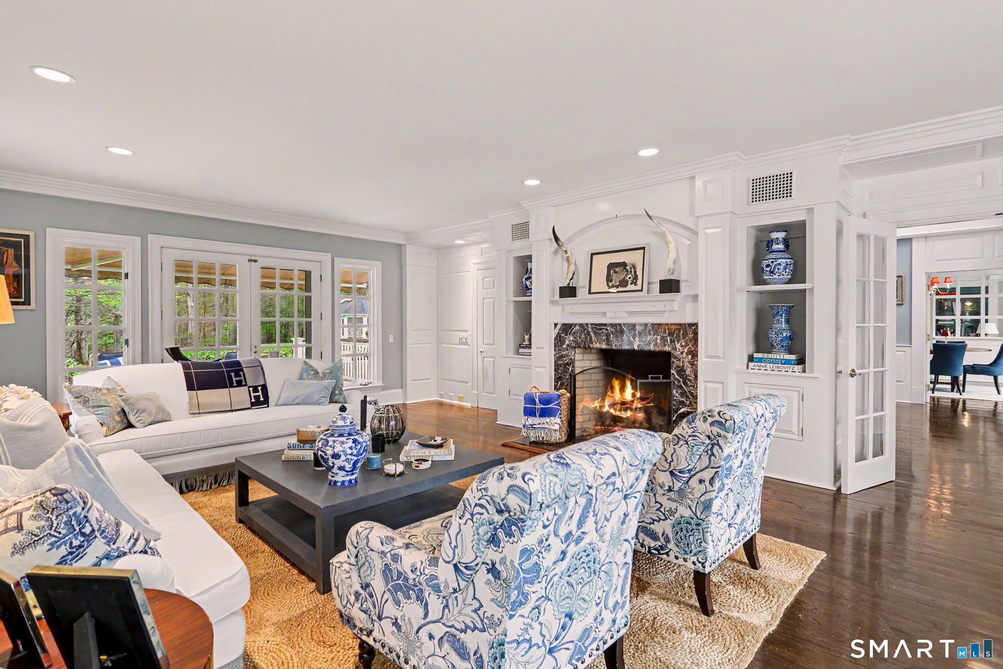 66 Gate Stone Lane Fairfield, CT 06824 - Photo 7 of 39 Stone Fireplace with custom built in bookshelves