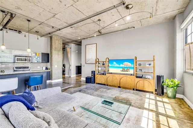 a living room with furniture and a couch