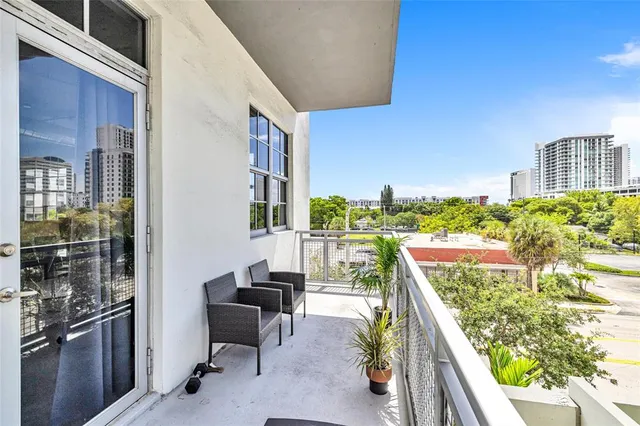 a view of a building from a living room