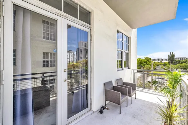 a bed room with a bed and a window