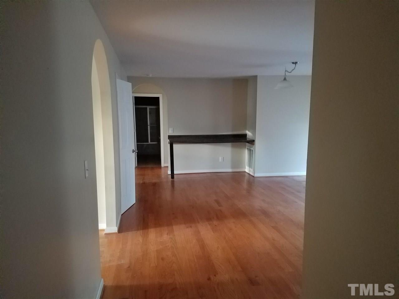 760 Bill Avery Road Coats, NC 27521 - Photo 7 of 14 a view of empty room with wooden floor