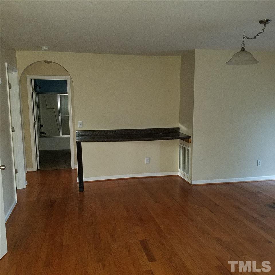 760 Bill Avery Road Coats, NC 27521 - Photo 10 of 14 a view of a room with wooden floor