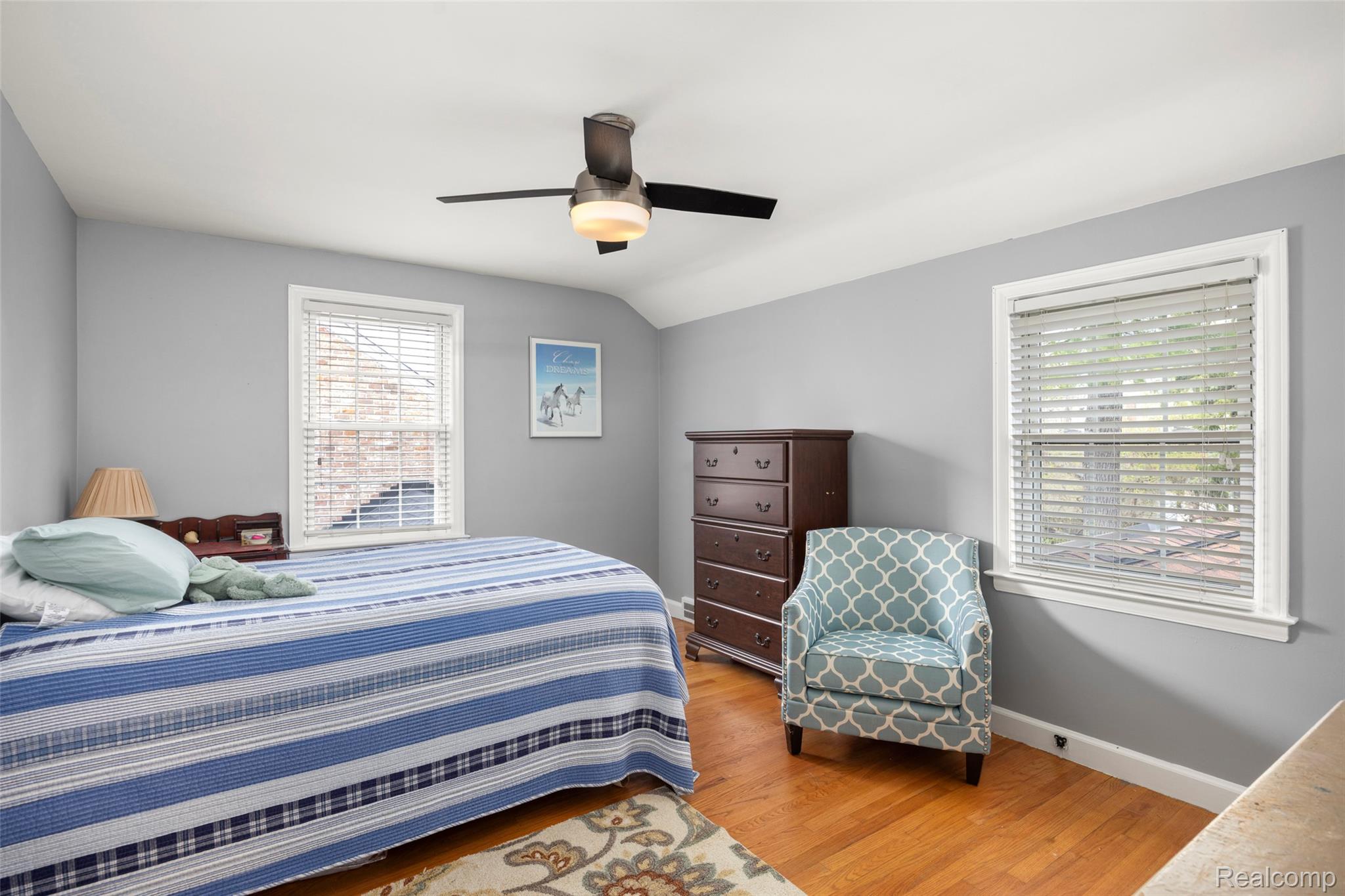 244 Kerby Road Grosse Pointe, MI 48236 - Photo 26 of 53 Bedroom featuring light wood finished floors, a ceiling fan, and lofted ceiling