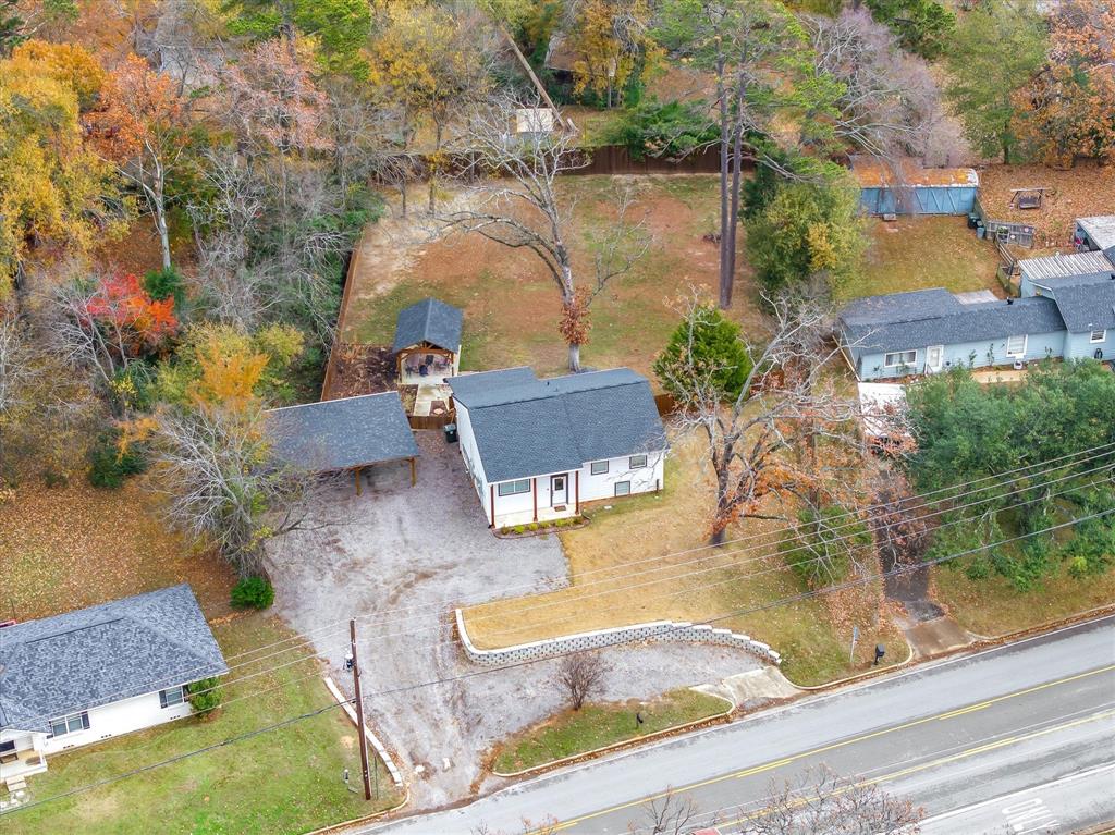 2422 Old Omen Road Tyler, TX 75701 - Photo 2 of 39 an aerial view of residential houses with outdoor space
