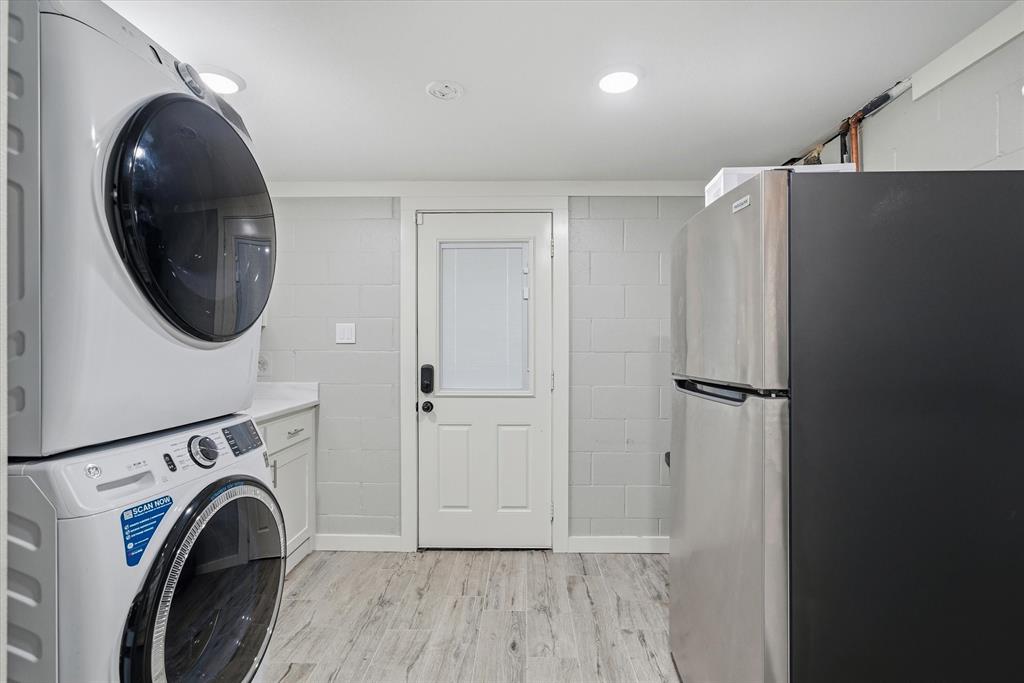 2422 Old Omen Road Tyler, TX 75701 - Photo 29 of 39 a view of a hallway with washer and dryer