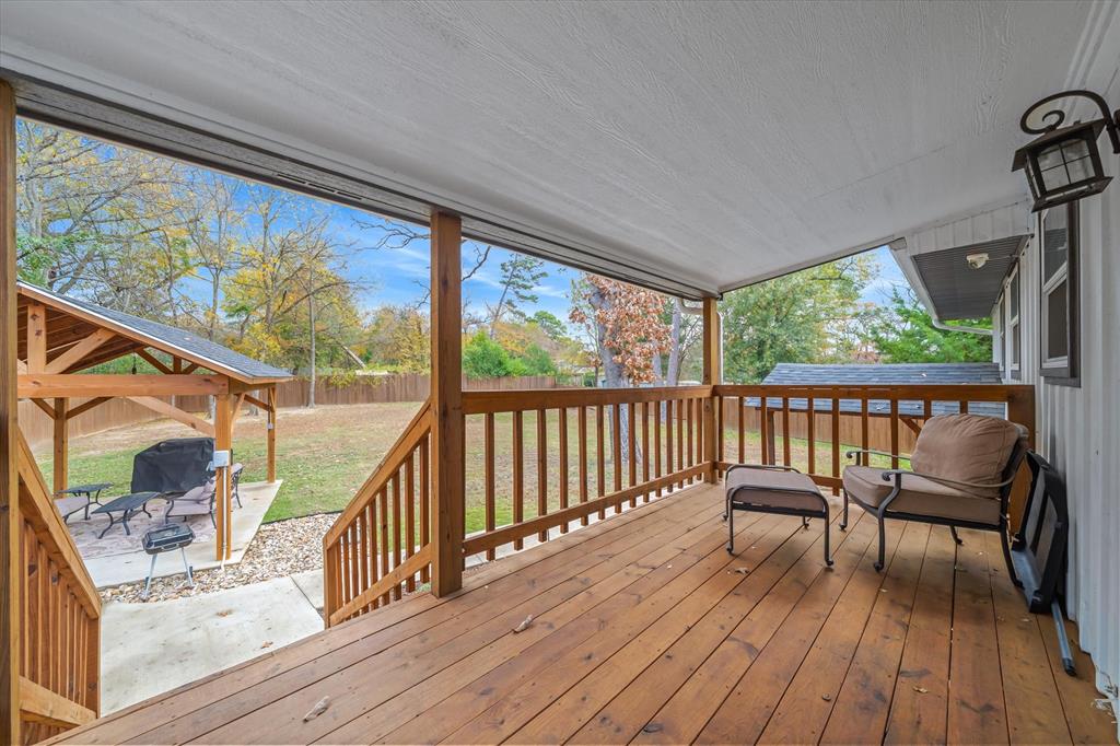 2422 Old Omen Road Tyler, TX 75701 - Photo 33 of 39 a view of a two chairs in the balcony