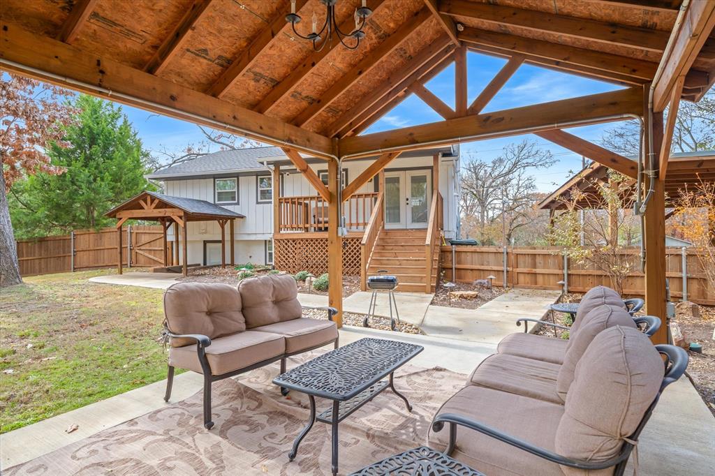 2422 Old Omen Road Tyler, TX 75701 - Photo 36 of 39 a outdoor living space with furniture and garden view