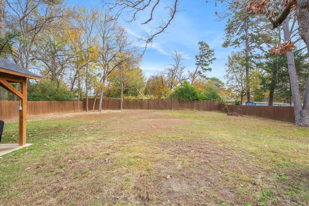 2422 Old Omen Road Tyler, TX 75701 - Photo 38 of 39 a view of yard with tree