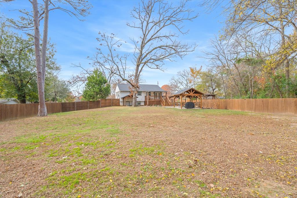 2422 Old Omen Road Tyler, TX 75701 - Photo 39 of 39 a view of yard with trees