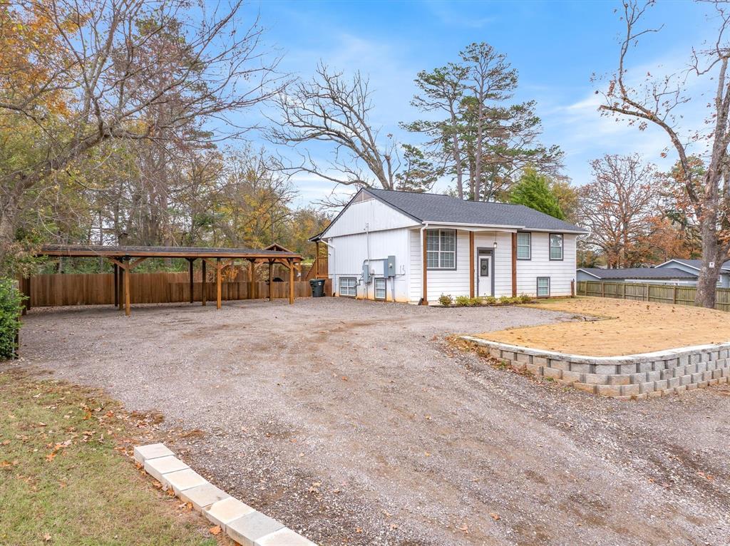 2422 Old Omen Road Tyler, TX 75701 - Photo 9 of 39 a view of outdoor space yard and swimming pool