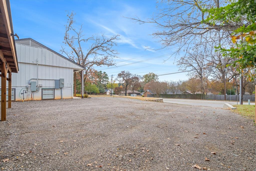 2422 Old Omen Road Tyler, TX 75701 - Photo 10 of 39 a view of large house with a road