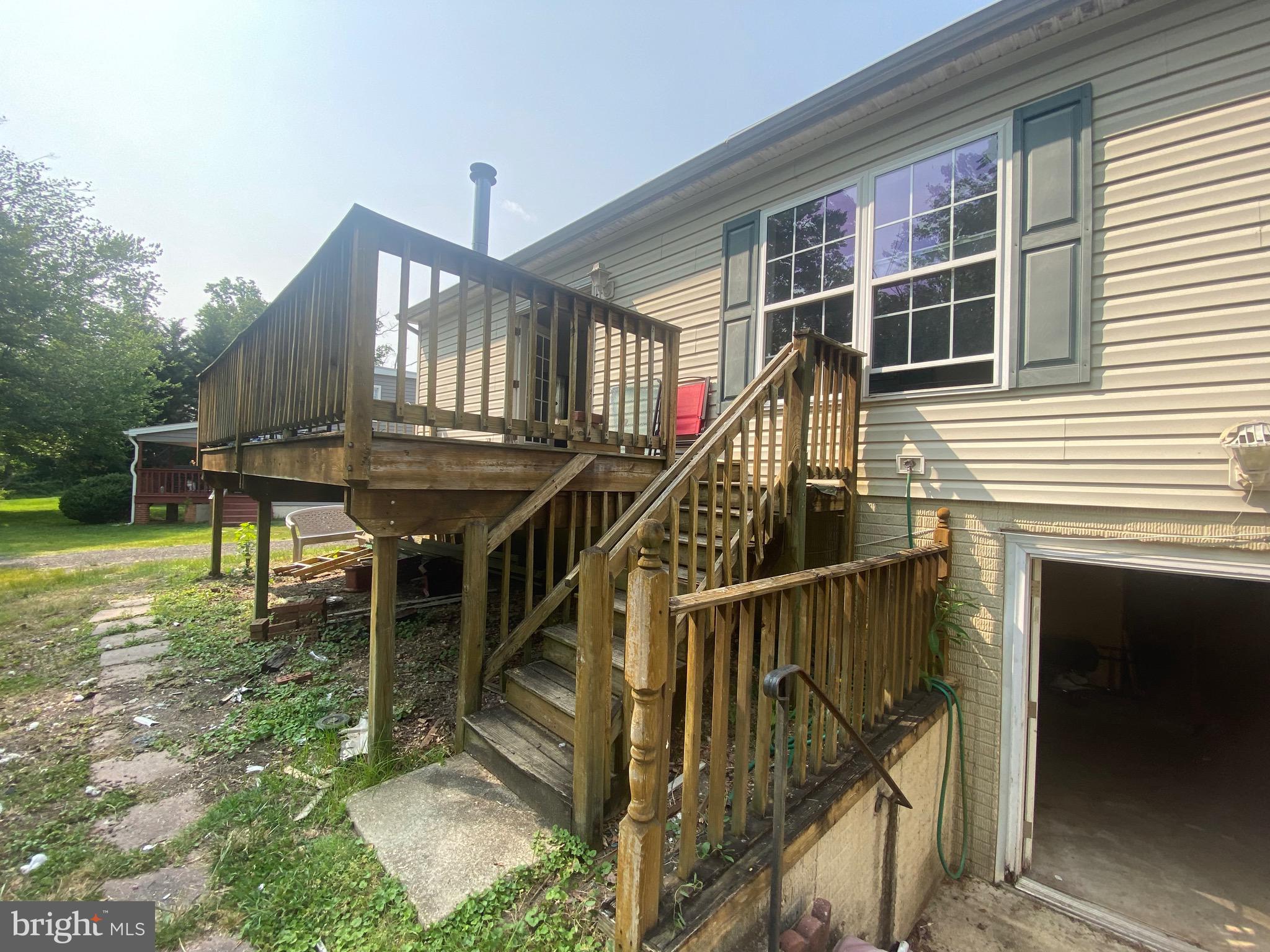 6701 Springbrook Lane Clinton, MD 20735 - Photo 35 of 53 backyard with deck