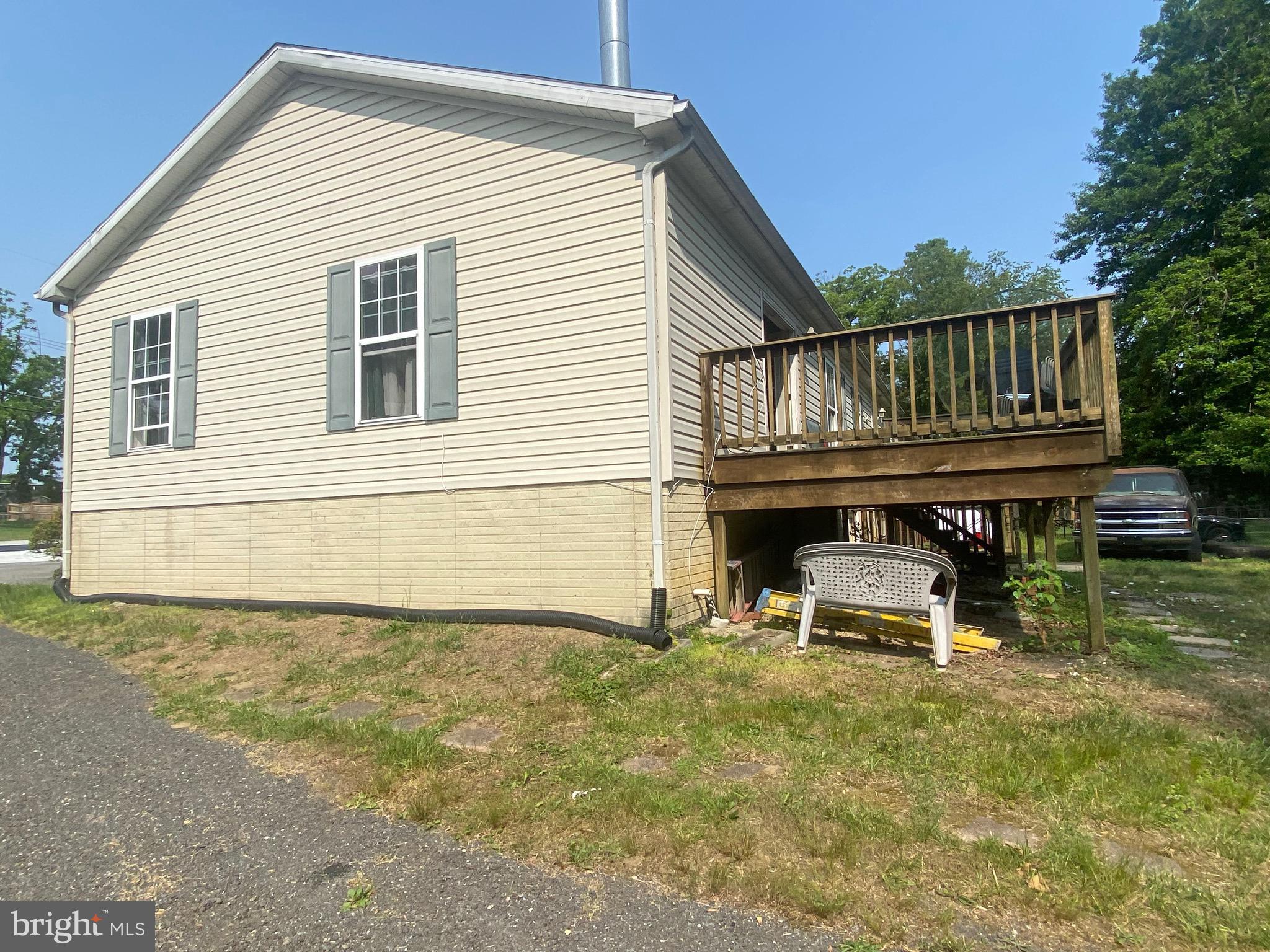 6701 Springbrook Lane Clinton, MD 20735 - Photo 47 of 53 Side view outside additional parking/ backyard