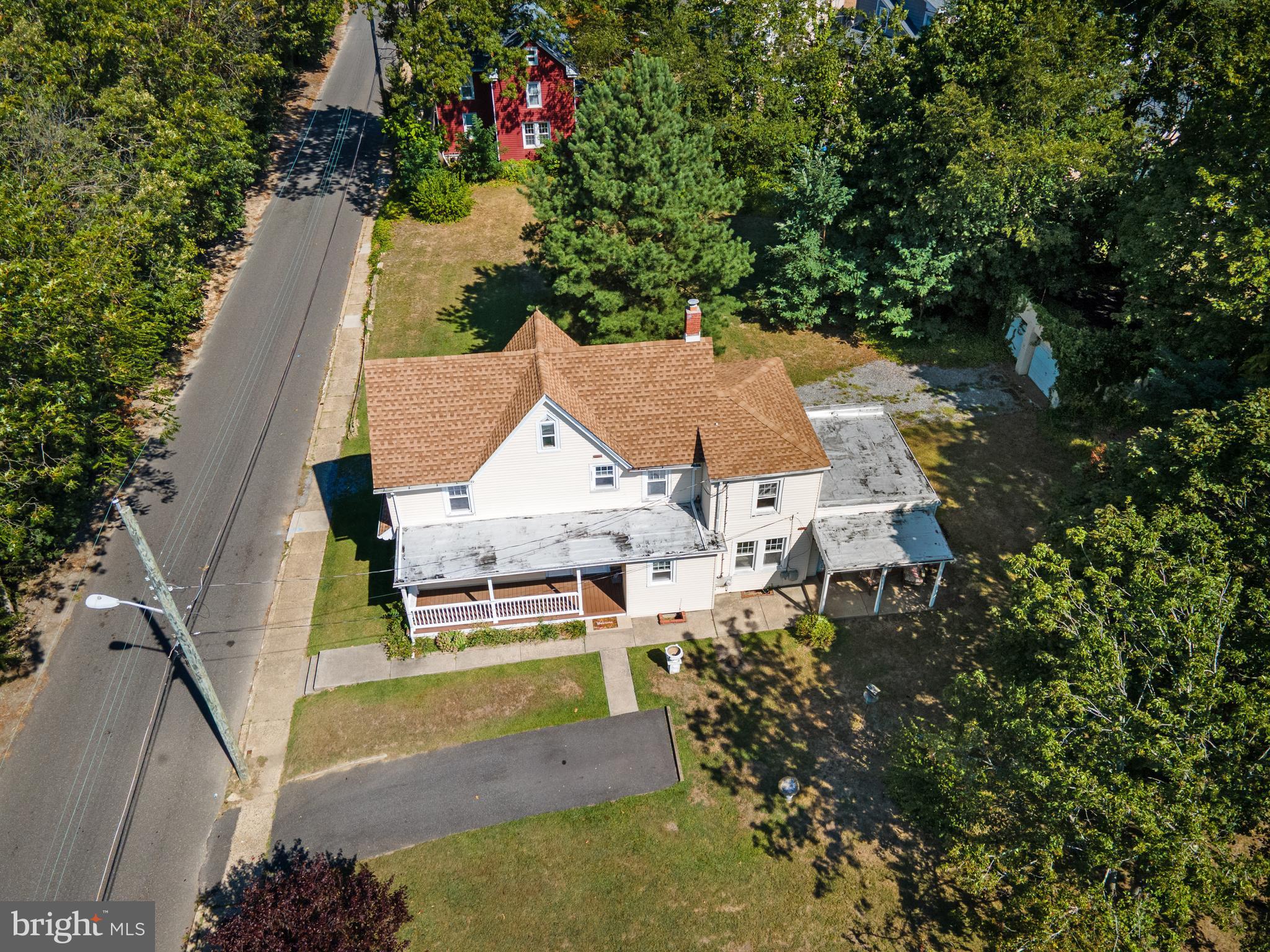 349 West Jersey Avenue Pitman, NJ 08071 - Photo 3 of 66 an aerial view of a house with a garden and trees