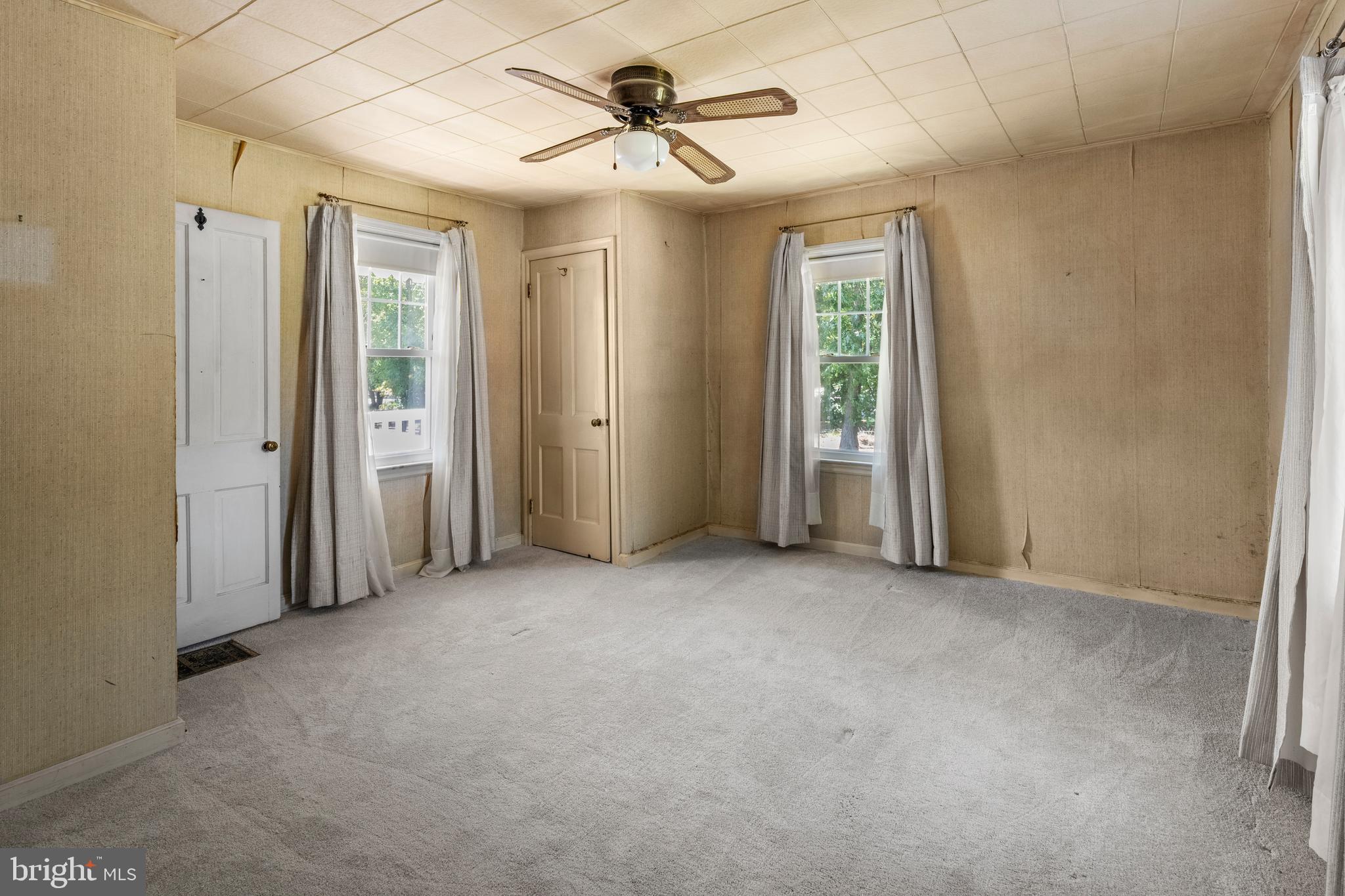 349 West Jersey Avenue Pitman, NJ 08071 - Photo 50 of 66 an empty room with windows and fan