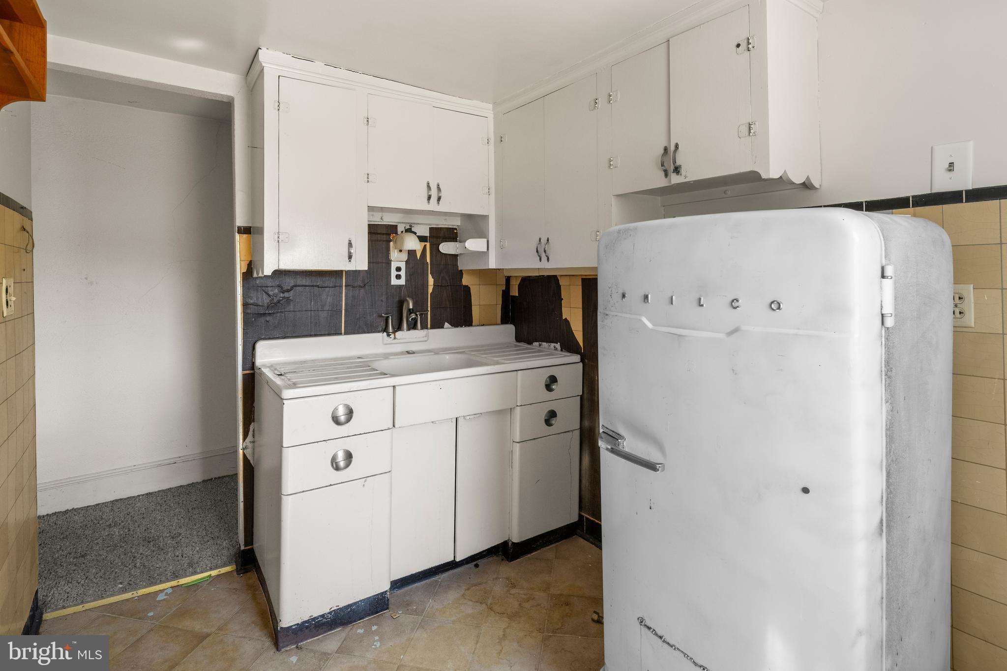 349 West Jersey Avenue Pitman, NJ 08071 - Photo 57 of 66 a kitchen with stainless steel appliances a refrigerator sink and cabinets