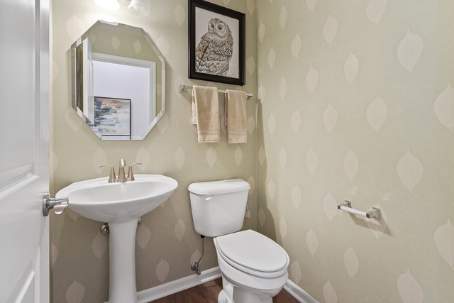 2009 Stuttle Road Batavia, IL 60510 - Photo 13 of 27 a bathroom with a toilet sink and mirror