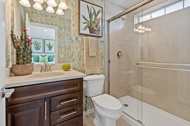2009 Stuttle Road Batavia, IL 60510 - Photo 21 of 27 a bathroom with a sink a toilet and shower
