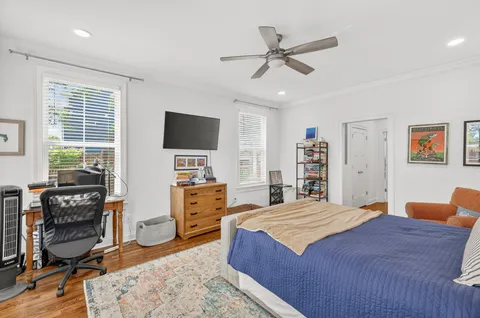 a room with a walk in closet and a shower