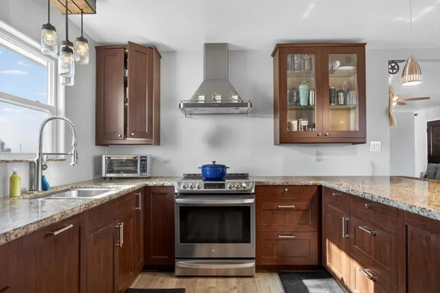 a view of swimming pool with outdoor seating