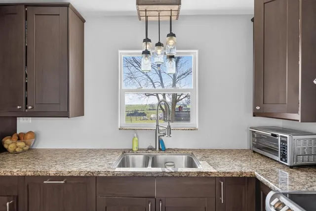 a view of a house with a back yard