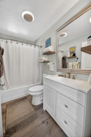 a view of a house with outdoor space and sitting area