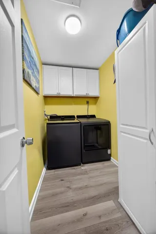 a view of a swimming pool with a yard