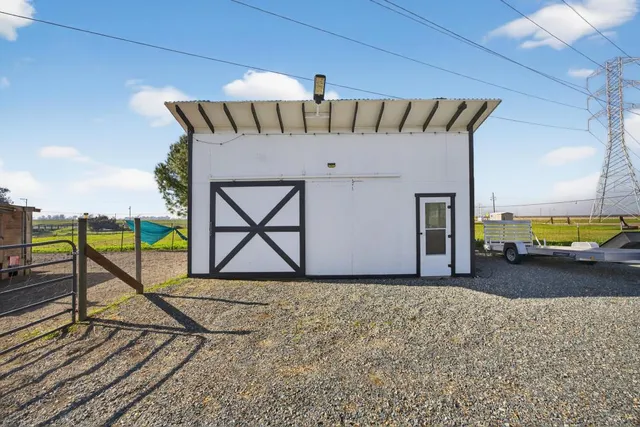 a view of a swimming pool and an outdoor space