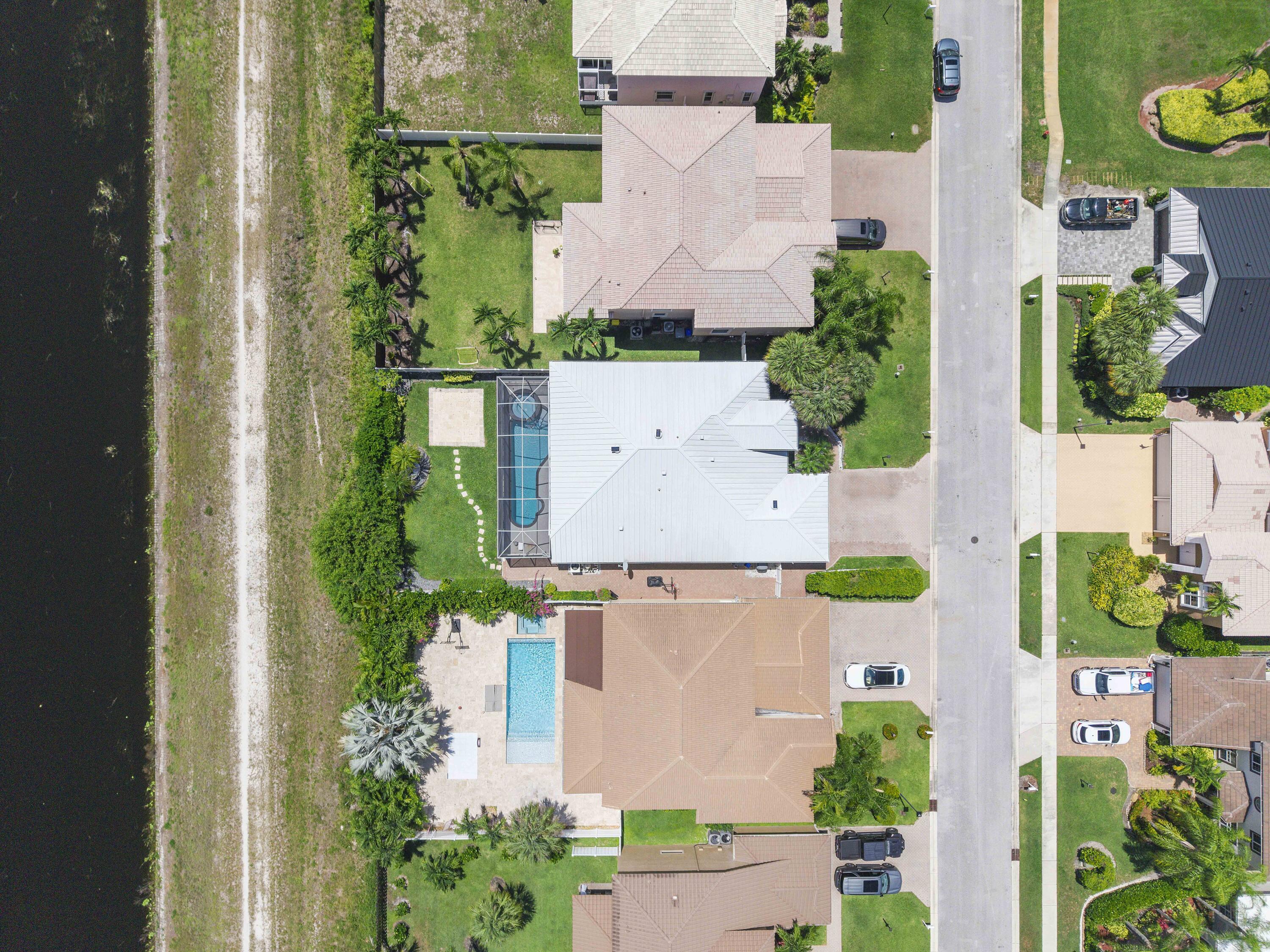 12328 St Simon Drive Boca Raton, FL 33428 - Photo 42 of 52 an aerial view of residential houses with outdoor space