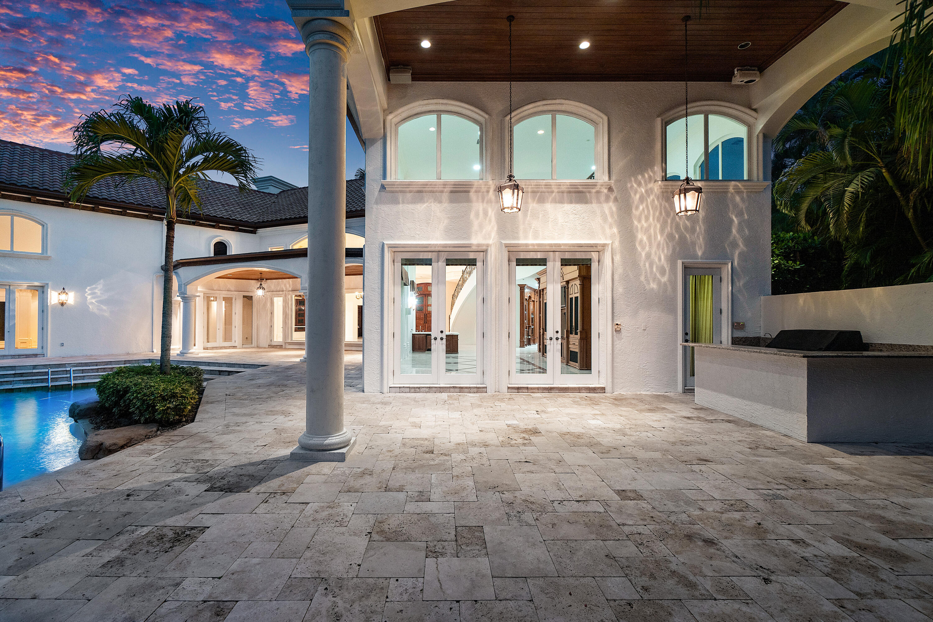 17951 Lake Estates Drive Boca Raton, FL 33496 - Photo 44 of 105 twilight covered loggia