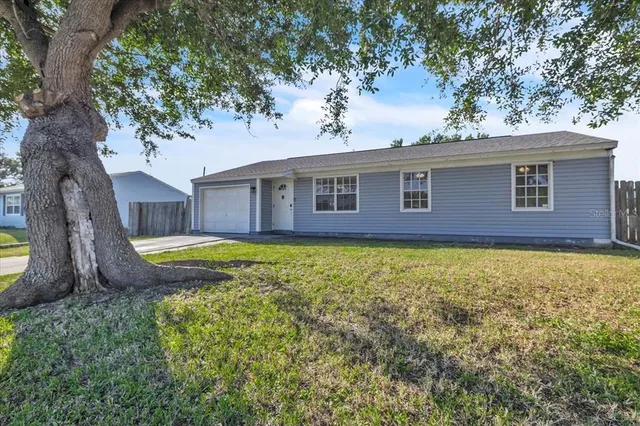a view of a house with a swimming pool