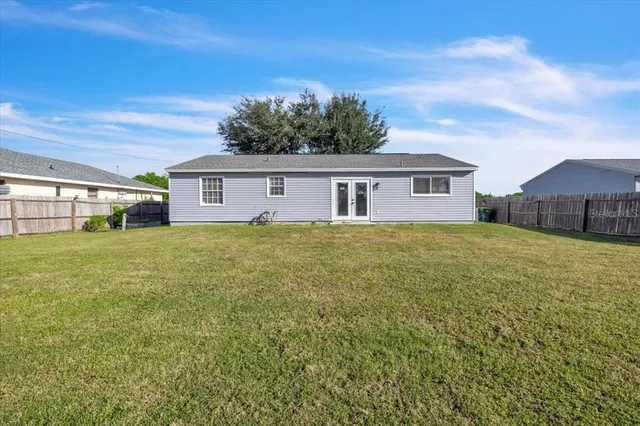 a house view with a garden space