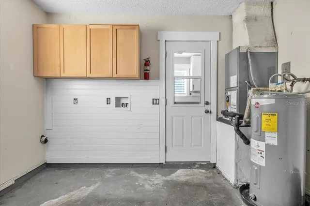 a view of room with wooden floor and closet