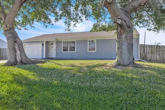 a house view with a garden space