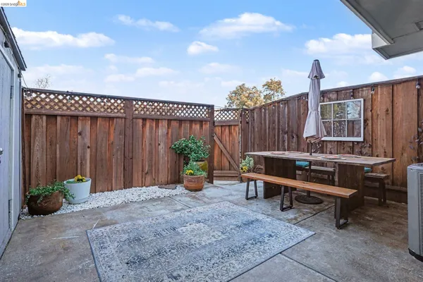 a view of a chairs in patio