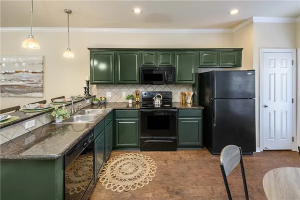 $345,000 | 305 Holleman Drive East, Unit 102, College Station, TX 77840