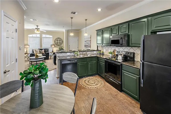 $345,000 | 305 Holleman Drive East, Unit 102, College Station, TX 77840