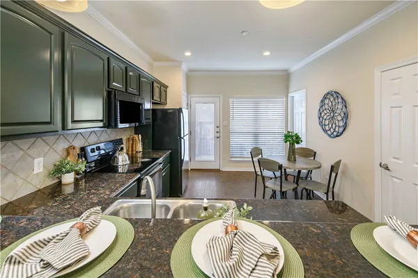 $345,000 | 305 Holleman Drive East, Unit 102, College Station, TX 77840