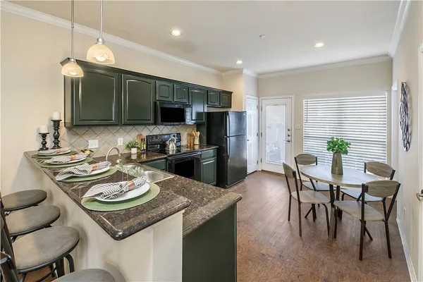 $345,000 | 305 Holleman Drive East, Unit 102, College Station, TX 77840