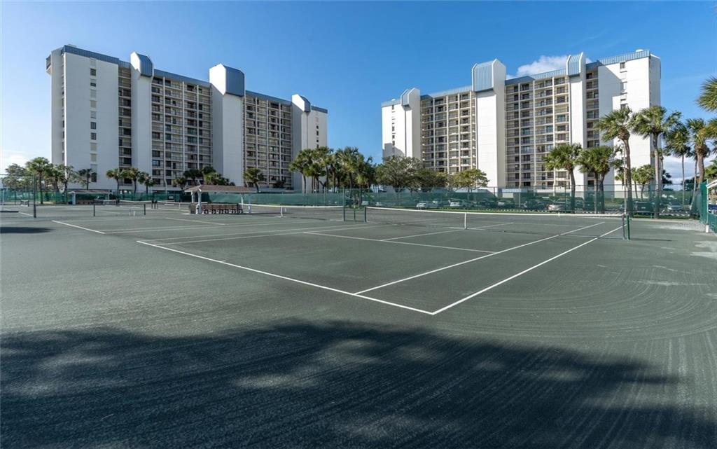 9415 Blind Pass Road, Unit 905 St. Pete Beach, FL 33706 - Photo 25 of 51 a view of a city with tall buildings