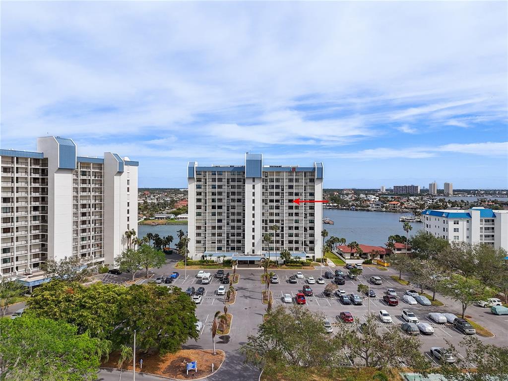 9415 Blind Pass Road, Unit 905 St. Pete Beach, FL 33706 - Photo 45 of 51 a view of a city with tall buildings